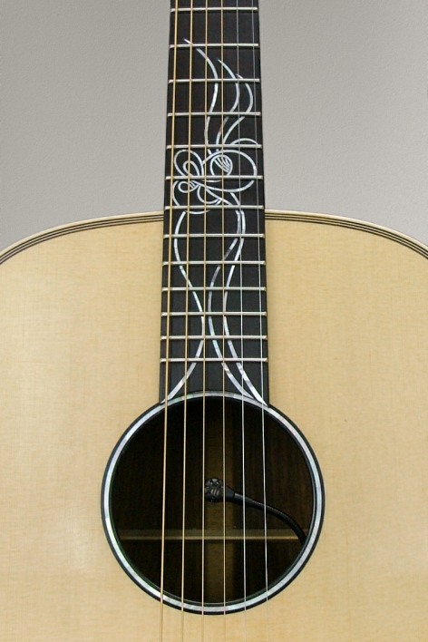 https://www.customguitarneckinlays.com/