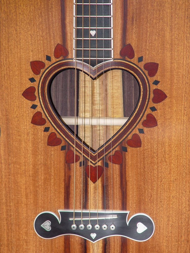 https://www.customguitarneckinlays.com/