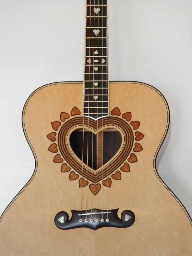 https://www.customguitarneckinlays.com/