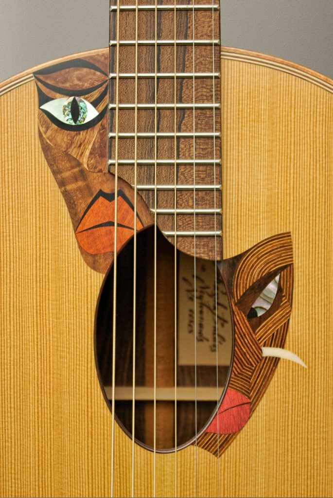 https://www.customguitarneckinlays.com/