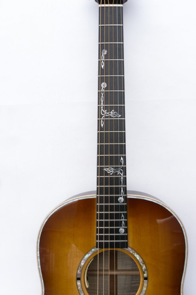 https://www.customguitarneckinlays.com/