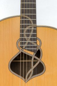 https://www.customguitarneckinlays.com/