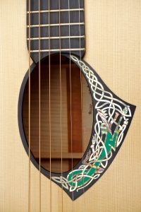 https://www.customguitarneckinlays.com/