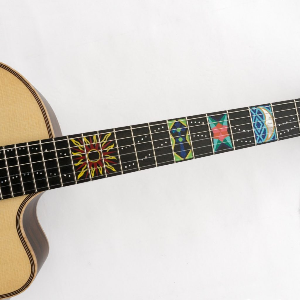 https://www.customguitarneckinlays.com/