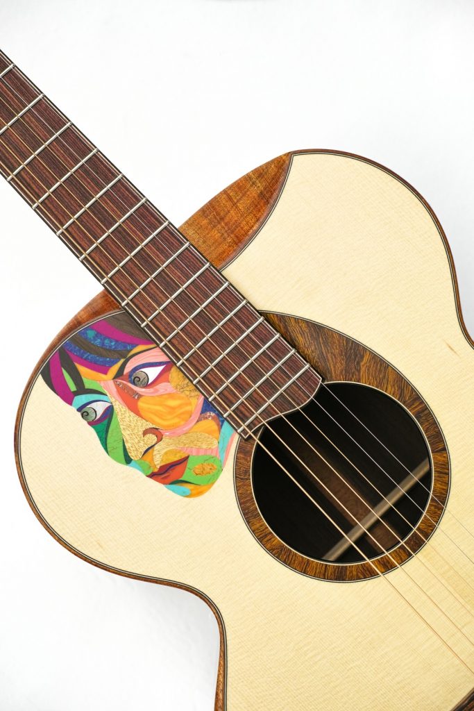 https://www.customguitarneckinlays.com/