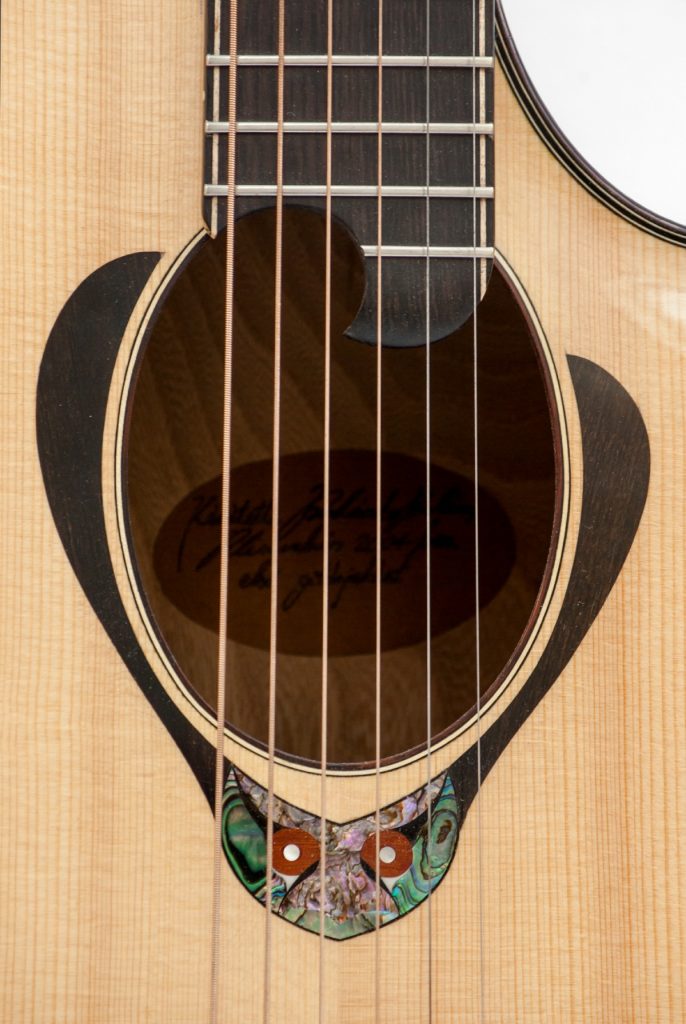 https://www.customguitarneckinlays.com/